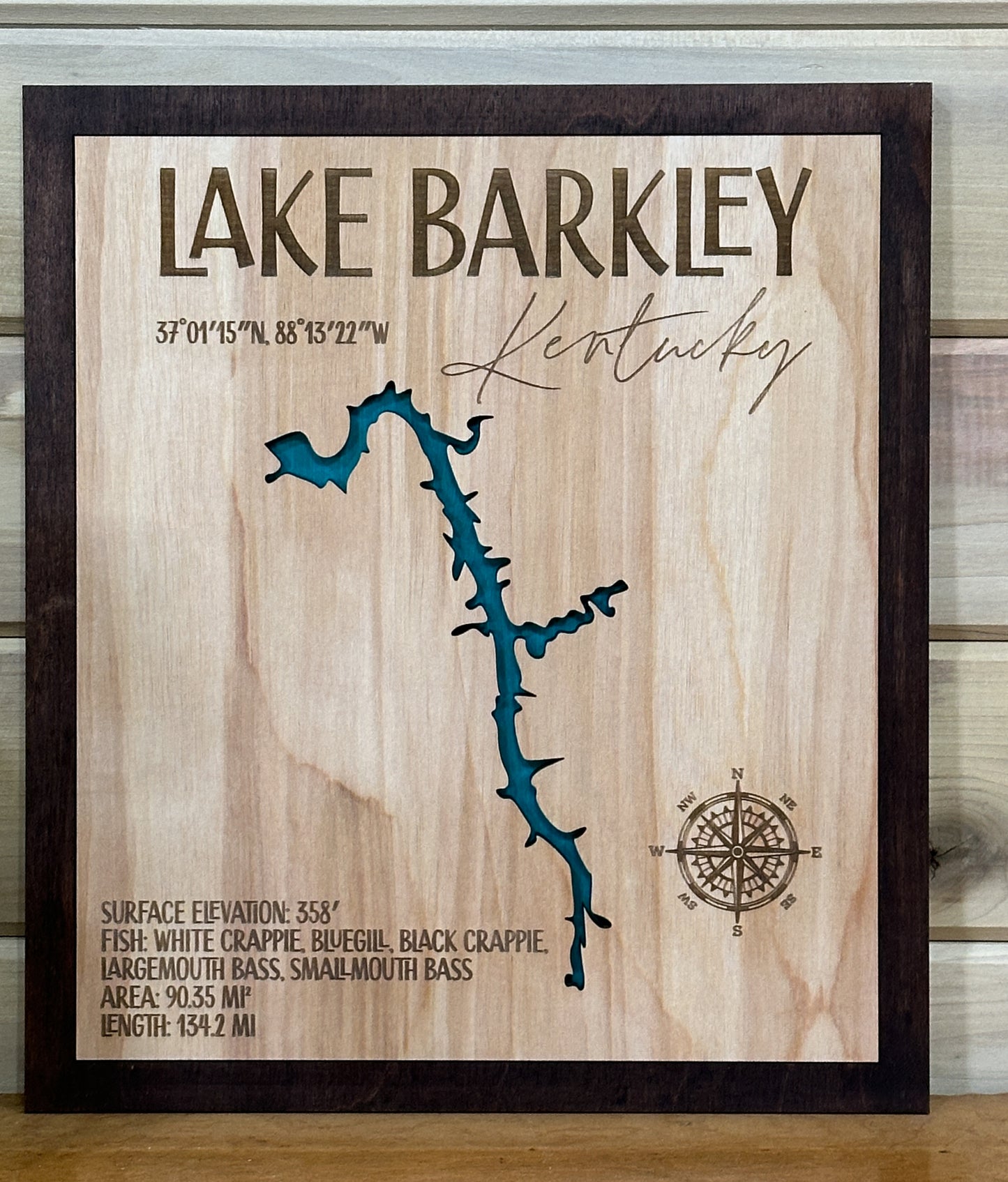 Laser engraved custom lake map wall art by The Hollow & Hill Co., featuring detailed lake house decor in natural wood finish.