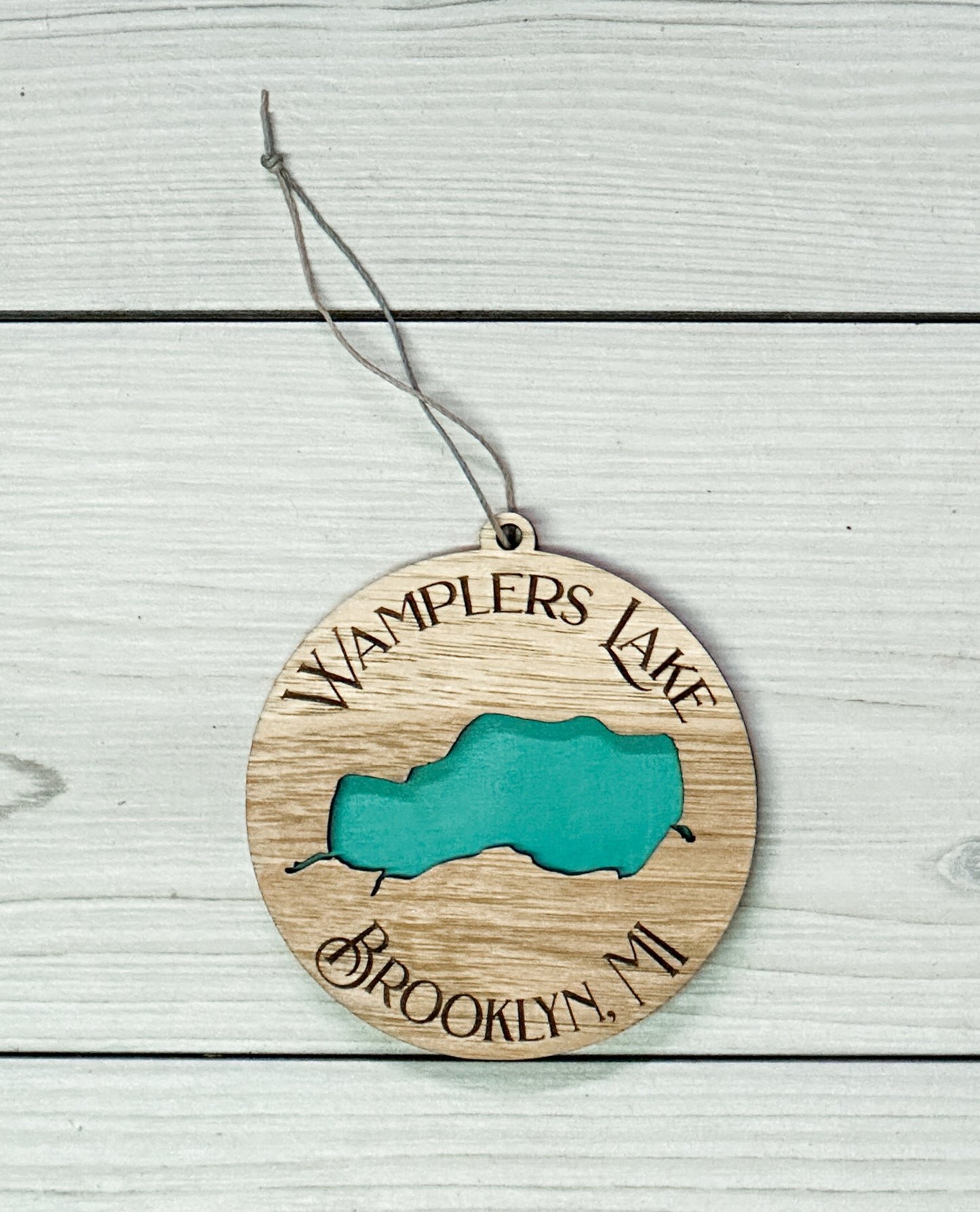 North Carolina Lake Lure ornament by The Hollow & Hill Co. LLC showing a detailed view of the scenic lake and surrounding landscape.