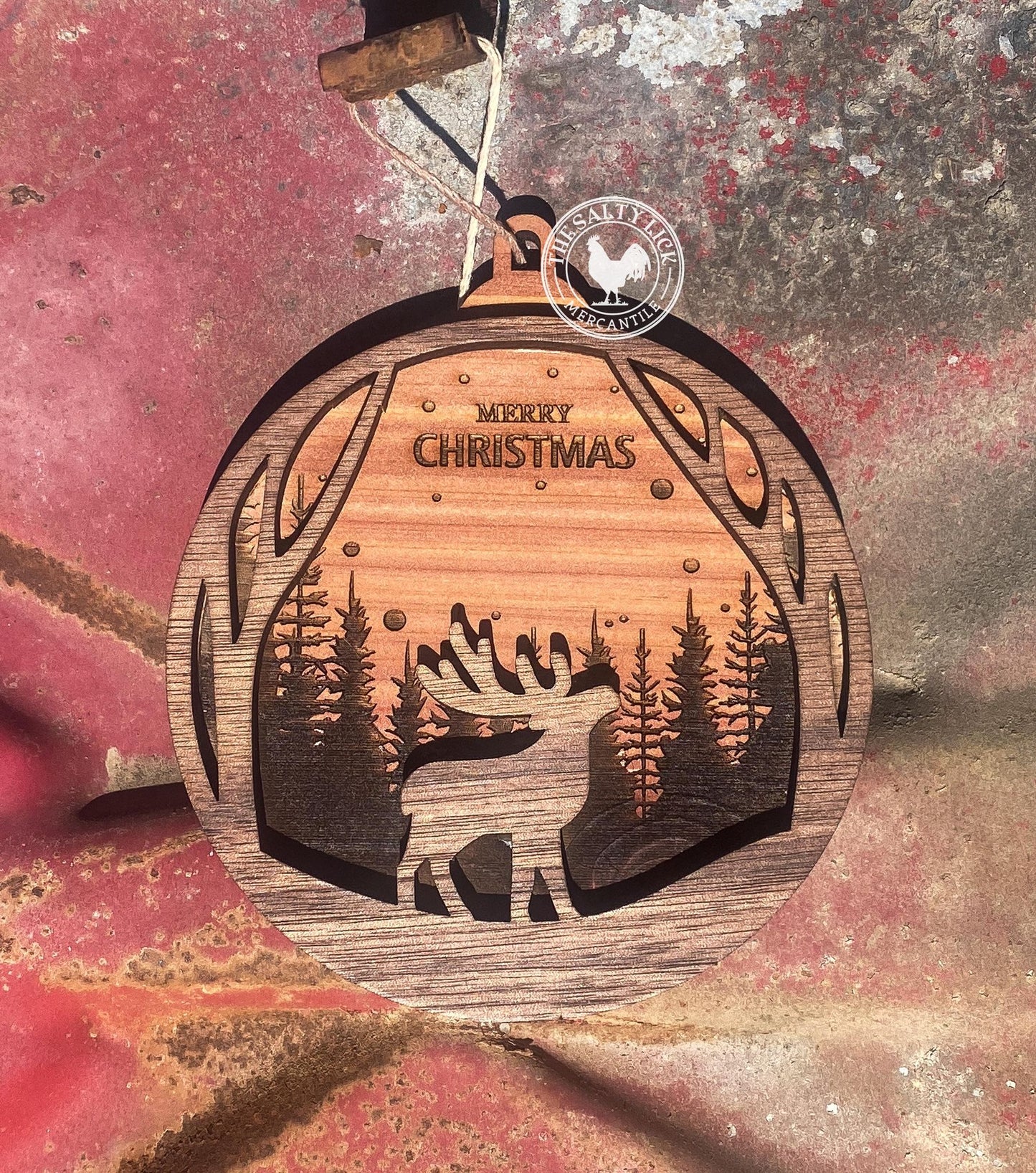 Personalized Christmas scene ornament engraved with custom holiday design, featuring festive imagery and holiday spirit from The Hollow & Hill Co.