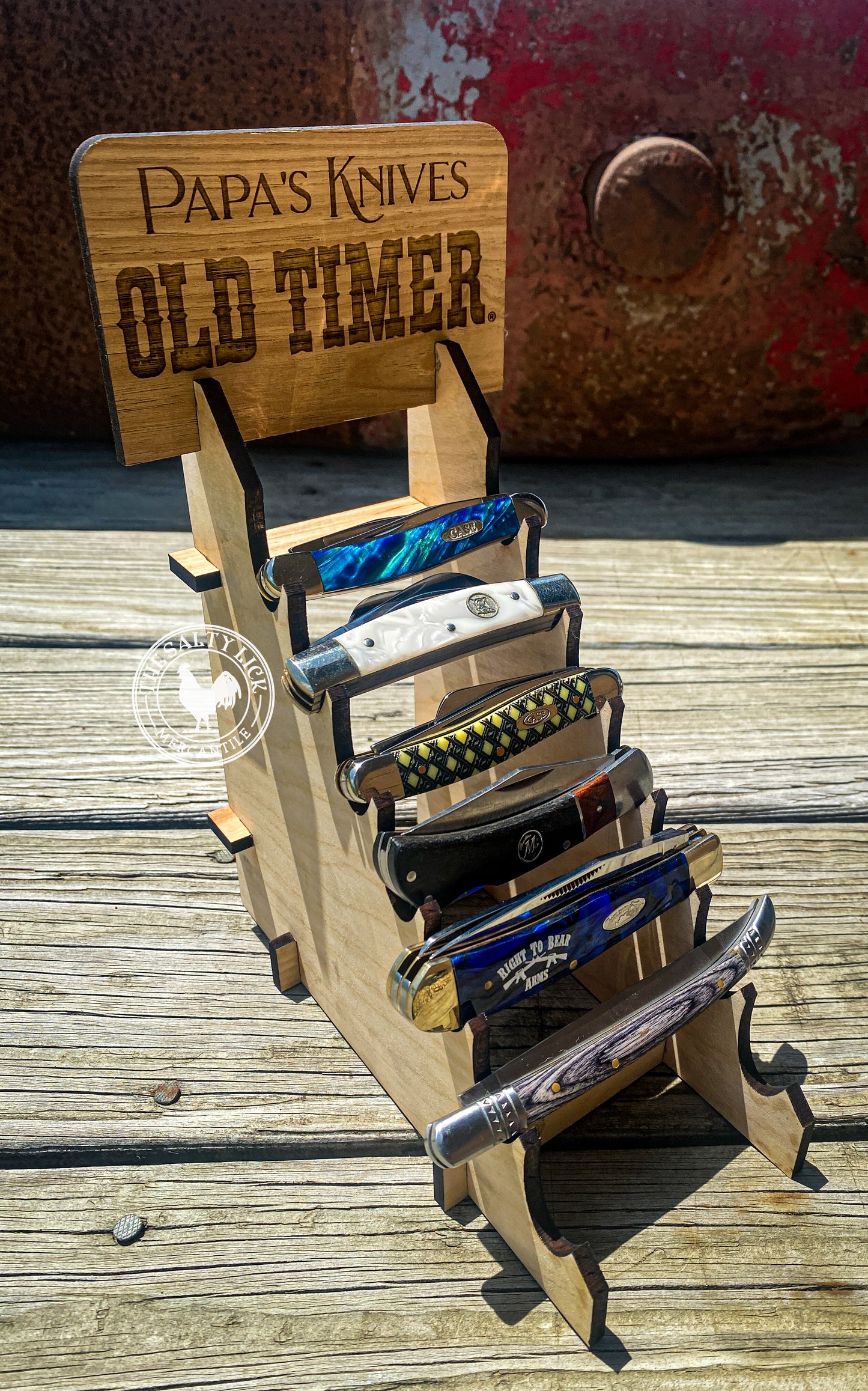 Personalized laser cut wood knife display from The Hollow & Hill Co. LLC, showcasing a custom wooden knife holder on a white background.