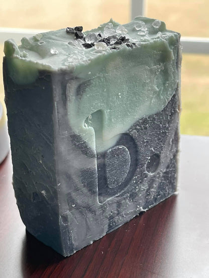 Custom soap stamp from The Hollow & Hill Co. LLC with intricate carved design for personalized soap branding.