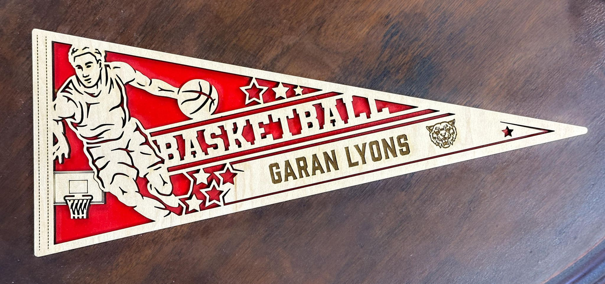 Laser cut personalized basketball pennant sports sign by The Hollow & Hill Co. LLC, featuring basketball design for male and female versions