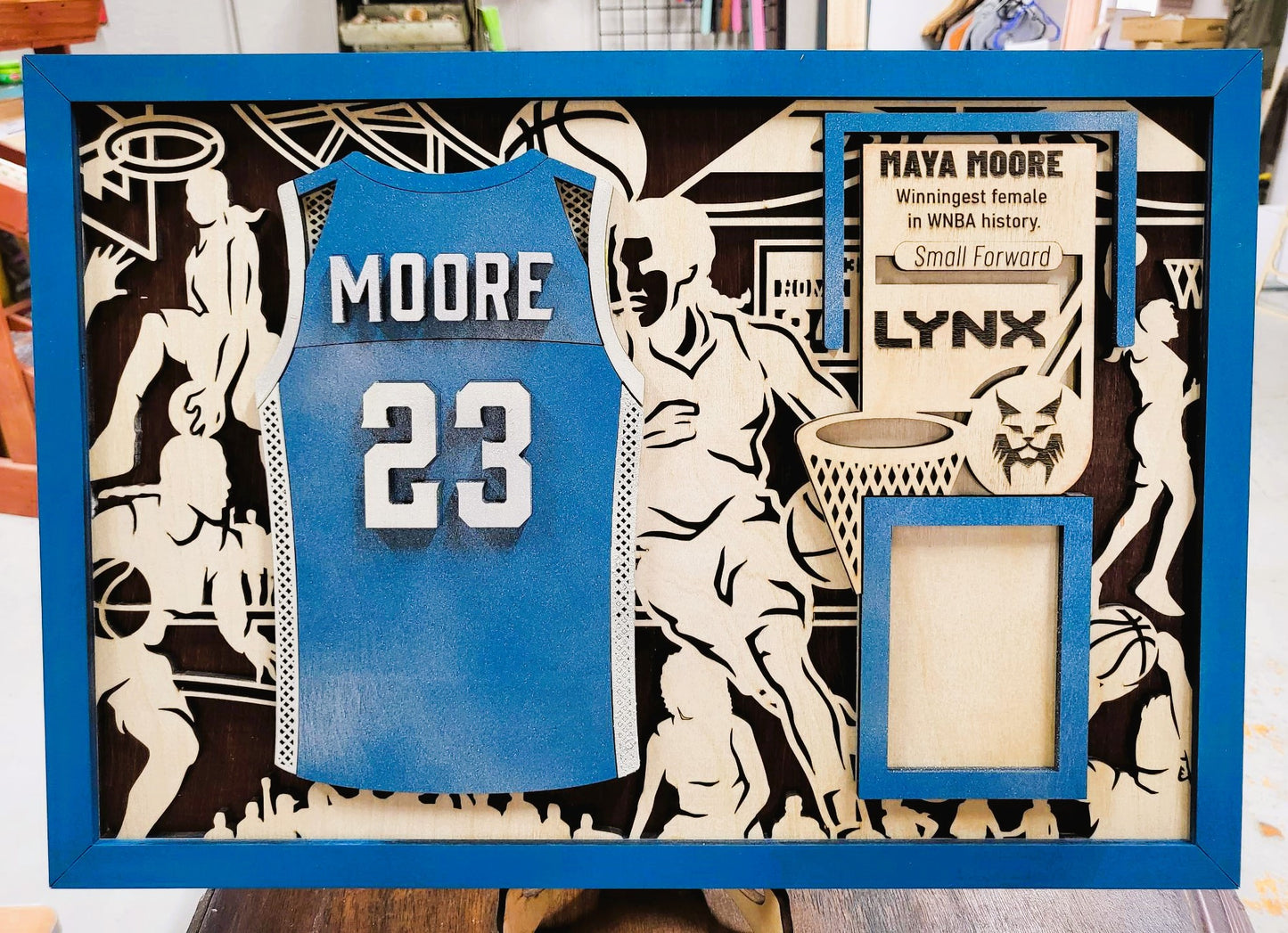 Personalized wood basketball sports sign from The Hollow & Hill Co., featuring male and female jersey design for basketball fans.
