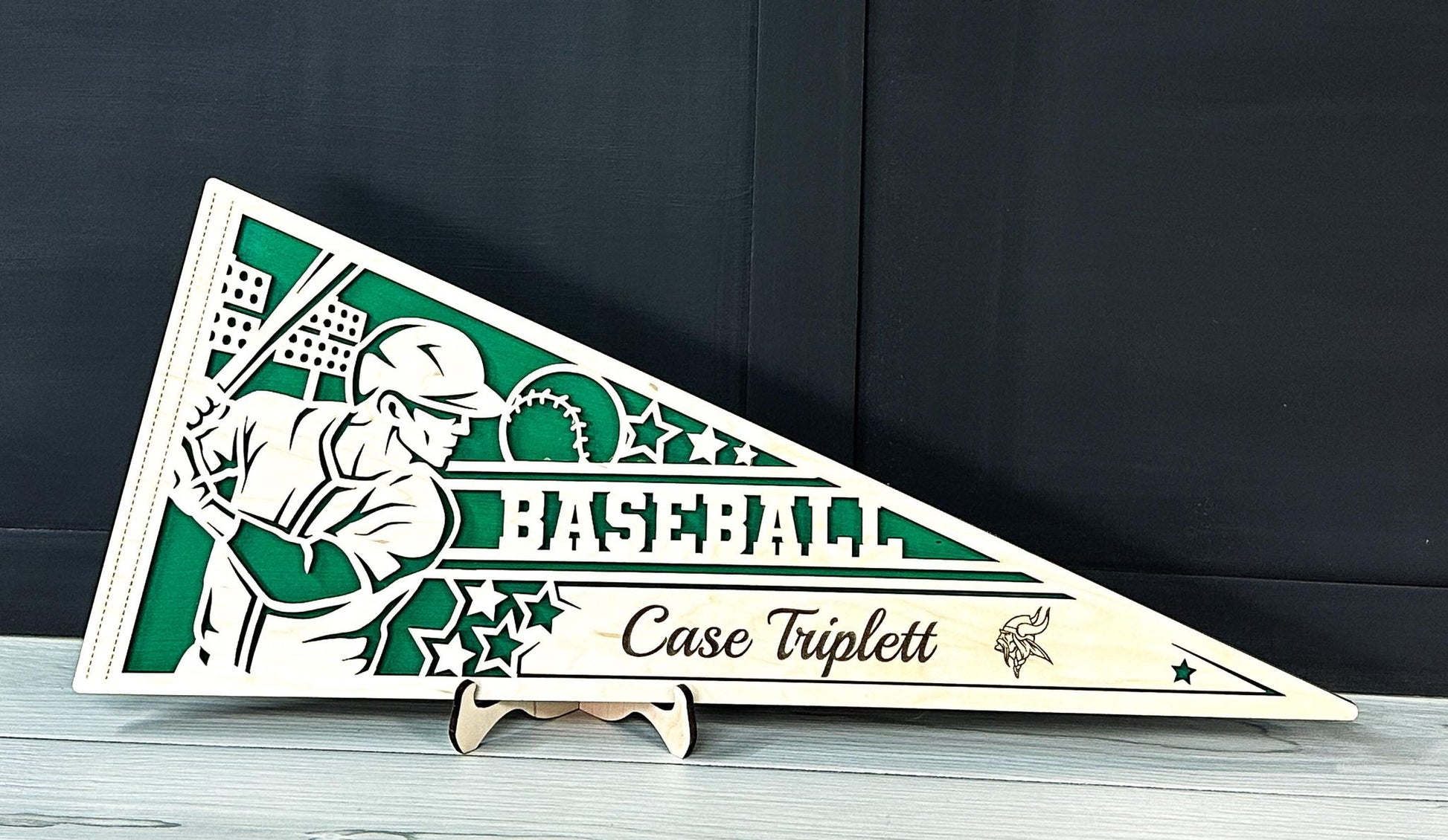 Laser cut personalized baseball pennant sports sign by The Hollow & Hill Co. LLC, featuring customizable male and female versions.