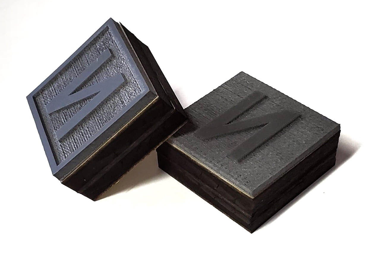 Custom rubber stamp by The Hollow & Hill Co. LLC with intricate design, perfect for personal or professional stamping projects.